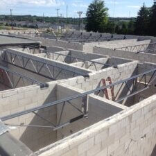 block wall and open web steel joist